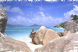 beach, rocks, palms, woman, blue sky - no clauds