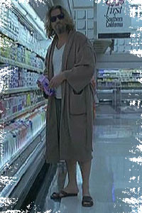 the dude standing in a shop in sandles and the usual dude kit, drinking milk